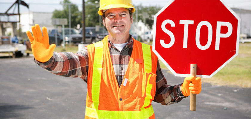 Man with stop sign